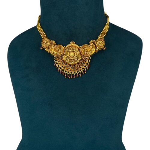 mango design with red stones