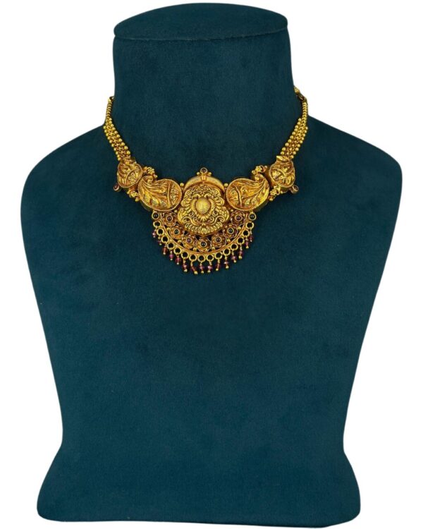 mango design with red stones